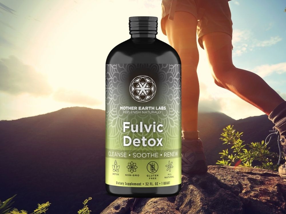 person hiking and a bottle of fulvic detox