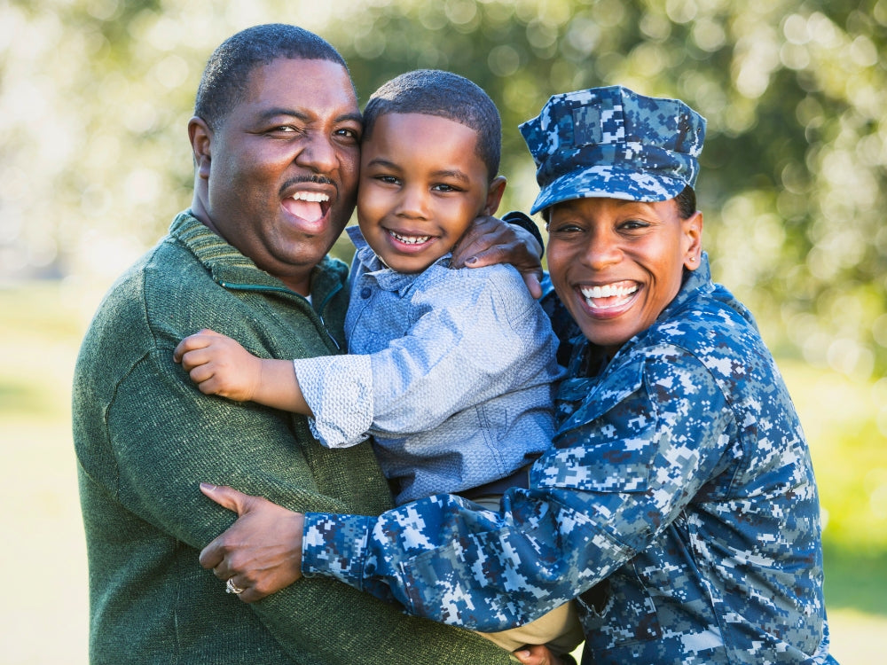 military family hugging